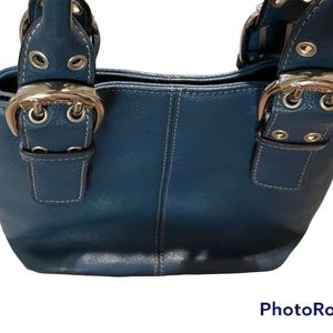Tignanello Azure Blue Pebbled Leather Handbag with Adjustable Handles
Tignanello